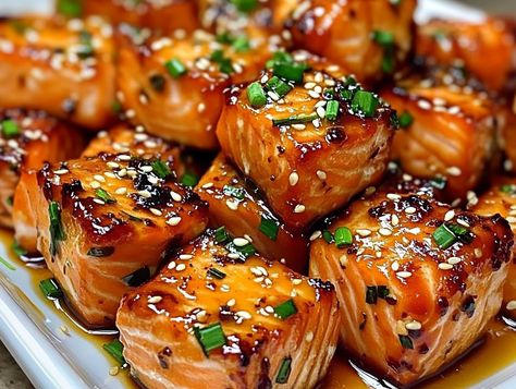 Bang Bang Salmon Bites are a fun, flavorful twist on the classic “Bang Bang” flavor, a blend of sweet, spicy, and creamy that pairs beautifully with tender salmon. This ... Read more Baked Salmon Cubes, Sweet Chili Salmon Bites, Crispy Bang Bang Salmon Bites Bowl, Crispy Bang Bang Salmon Bites, Bang Bang Salmon Bites, Bang Bang Salmon, Salmon Bites Recipe, Oven Salmon, Salmon Bites