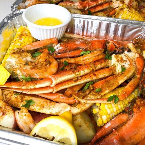 Easy Seafood Bake - There's Food at Home Crab Foil Packets Ovens, Seafood Oven Recipes, Seafood Boil Sheet Pan, Shrimp And Crab Boil In Oven, Baked Crab Boil Recipe, Crab Bake Party Seafood Boil, Sea Food Boil Recipe In Oven, Crab Boil Oven Recipe, Crab Leg And Shrimp Boil Recipe