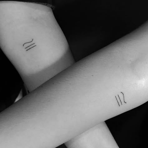 16 Fine Line Tattoos For Families That Will Perfectly Represent Your Bond & Love Small Matching Tattoos Family, Small Tattoos To Represent Family, Small Tattoos Family Symbols, Symbol Representing Family, Tattoo That Means Family, Symbols That Mean Love, Family Tattoo Symbol, Minimal Sibling Tattoo, Fine Line Tattoos For Moms With Kids