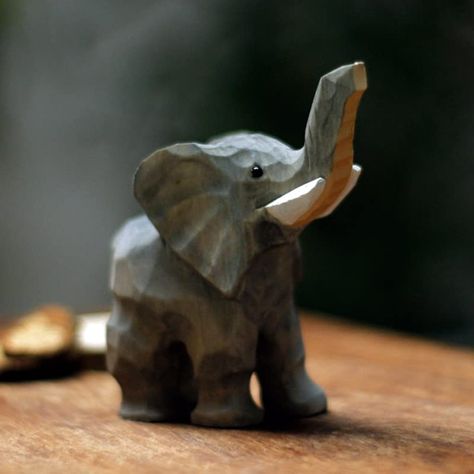 PRICES MAY VARY. Package included:1*Wood Elephant， Size of Elephant:11.5×4.2×10.8cm/4.52×1.65×4.25inch Premium Materials:Made of basswood. Natural material, environmentally friendly and non-toxic, durable. Be careful not to rain or expose to the sun! Elephant shape design.It is simple, playful, peaceful and gentle, bringing you pleasure. Hand carved. Exquisitely crafted and lifelike, it would make the perfect gift for any nature lover. Purely handmade. Suitable for study,living room, hallway,tab Carved Animals, Wood Elephant, Small Carved Wooden Animals, Elephant Wood Art, Carved Elephant, Wood Carved Elephants, Carved Wooden Animals, Home Decor Sculptures, Elephant Ornament