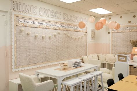 Part 2 of our classroom makeover reveal! Keep swiping to see all of the tiny details that make this room so magical! ✨😍 Click the link in our bio to shop this collection! #classroommakeover #classroomreveal #classroomtransformation #classroomsetup #classroomideas #classroomdecor #neutralclassroom #bohoclassroom #calmclassroom #teacherdecor #teachersofinstagram Classroom decor ideas Calm classroom ideas Neutral classroom decor Classroom makeover Classroom setup Boho vibes White Brick Classroom Decor, Neutral Bulletin Boards, Classroom Fridge Bulletin Board, Better Than Paper Bulletin Board Ideas, Lights Bulletin Board, Cozy Classroom Ideas High School, Minimalist Classroom Decor, Teacher Desk Area Classroom Setup, Simple Classroom Decor