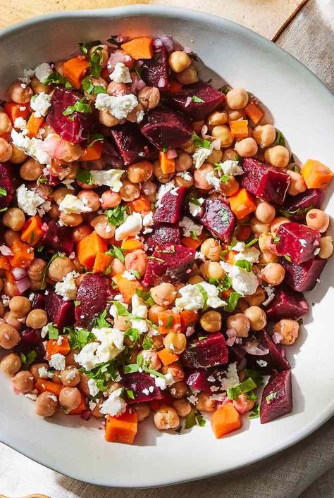 This chickpea, beet & feta salad is a vibrant blend of flavors and textures, marrying the earthy sweetness of beets with the creamy richness of feta cheese, all tied together with a zesty lemon-garlic dressing Beet Feta Salad, Girlfriend Dinner, Weight Watchers Side Dishes, Bean Salad Recipes Healthy, Gina Livy, Bean Salad Healthy, Garlic Vinaigrette, Fiber Recipes, Healthy Beans