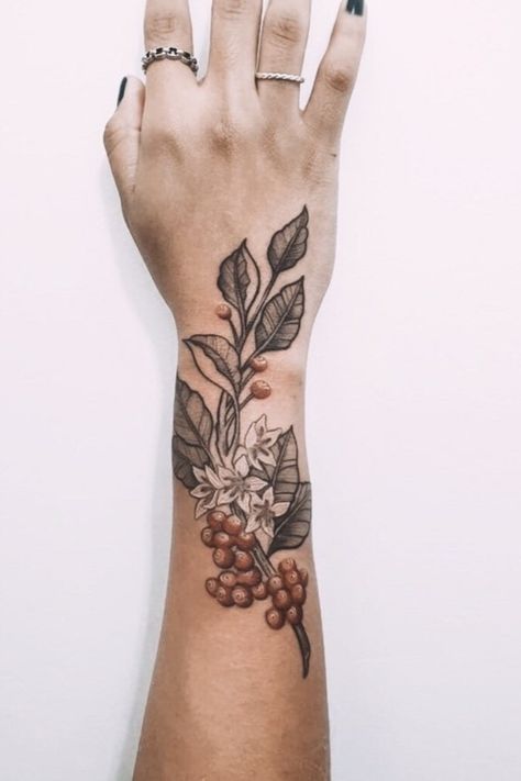 #coffeetatoos #tattooideas Coffee Plant Tattoo Color, Coffee Berry Tattoo, Coffee Cherry Tattoo, Coffee Leaves Tattoo, Cuban Coffee Tattoo, Wrist Plant Tattoo, Hand Plant Tattoo, Flower And Plant Tattoos, Plant Tattoo Hand