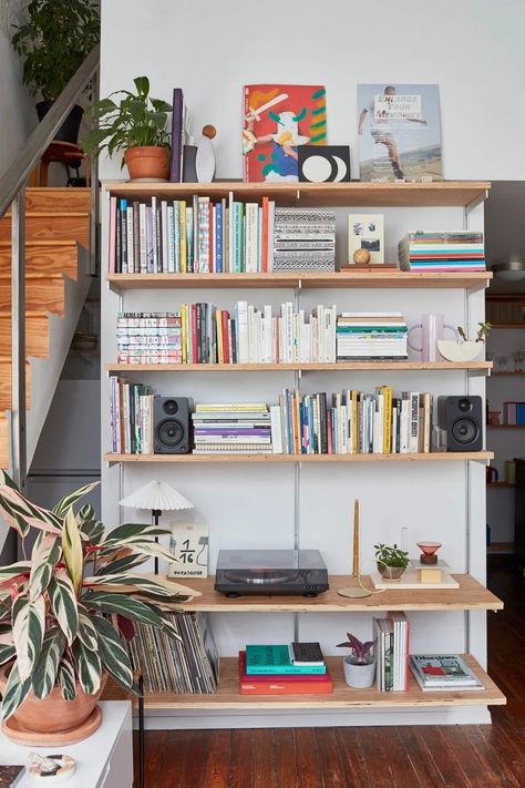 Art Studio Bookshelves, Floating Shelves Around Mounted Tv, Couch In Front Of Curtains, Bright Boho Office, Danish Apartment Aesthetic, Bookshelf Cubes, Eclectic Shelving, Track Shelving, Eclectic Apartment