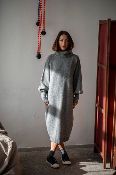 Keep yourself cozy and warm during those cold autumn and winter months in this versatile, soft Merino wool sweater dress designed to last you years. The oversized fit comes with a calf-length hem, which is ribbed like the sleeve ends and the turtleneck. The roll neck is so chunky that it can easily replace the scarf in a windy day. Long Wool Dress Outfit, Styling Dresses In Winter, Wool Dress Outfit, Wool Dress Winter, Grey Wool Dress, Cozy Knitwear, Wool Dresses, Outfit Knit, Timeless Staples