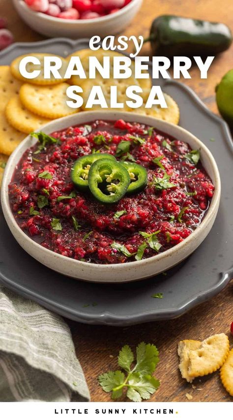 Fresh and spicy Cranberry Salsa is the best holiday appetizer, made with tart cranberries, spicy jalapenos, and just 5 other ingredients. Cranberries With Jalapeno, Jalapeño Cranberry Salsa, Cranberry Jalepeno Recipes, Spicy Cranberry Salsa, Jalapeño Cranberry Sauce, Cranberry Jalapeno Salsa, Cranberry Salsa Recipes, Cranberry Salsa Dip, Savoury Dips