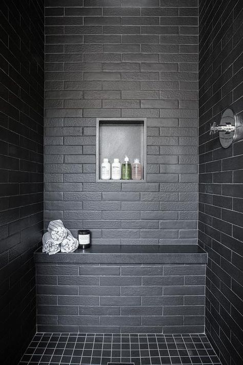 A black tiled shower bench fitted with a black quartz top sits on black gird floor tiles and against black brick wall tiles finished with a black niche. Matte Bathroom Tiles, Black Matte Bathroom, Matte Bathroom, Black Subway Tiles, California Beach House, Black Brick Wall, Bathroom Build, White Oak Hardwood Floors, Shower Tile Ideas