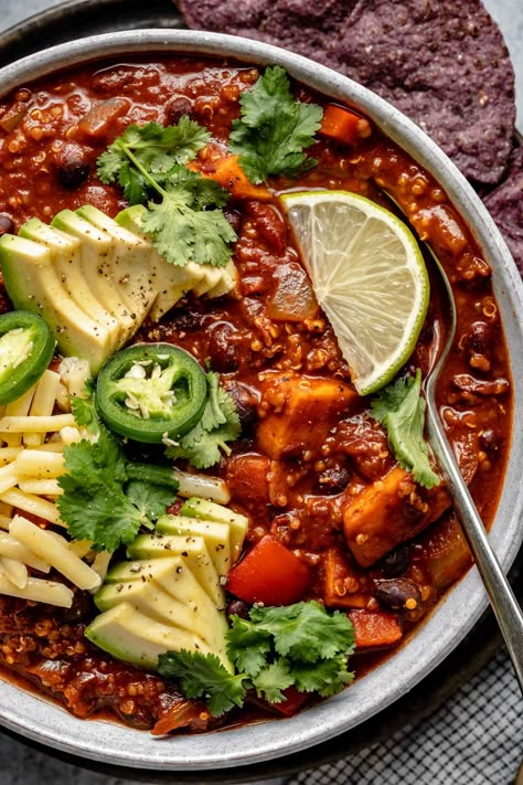 A new favorite chili recipe – Hearty Sweet Potato Quinoa Chili with Black Beans! This vegan quinoa chili is hearty & rich in flavor, thanks to a base of quinoa, sweet potatoes, black beans, & spices. Easy to make (Instant Pot & Slow Cooker directions provided!), perfect for meal prep, & totally wholesome (13+ grams plant-based protein per serving!). Naturally vegetarian, dairy-free, vegan & gluten-free. #veganchili #veganrecipes #vegandinner #soupideas #plantbasedforbeginners #plantbasedmeals Sweet Potato Quinoa Chili, Vegan Quinoa Chili, Chili With Black Beans, Quinoa Chili Recipe, Meatless Chili, Sweet Potato Quinoa, Potato Chili, Favorite Chili Recipe, Quinoa Chili