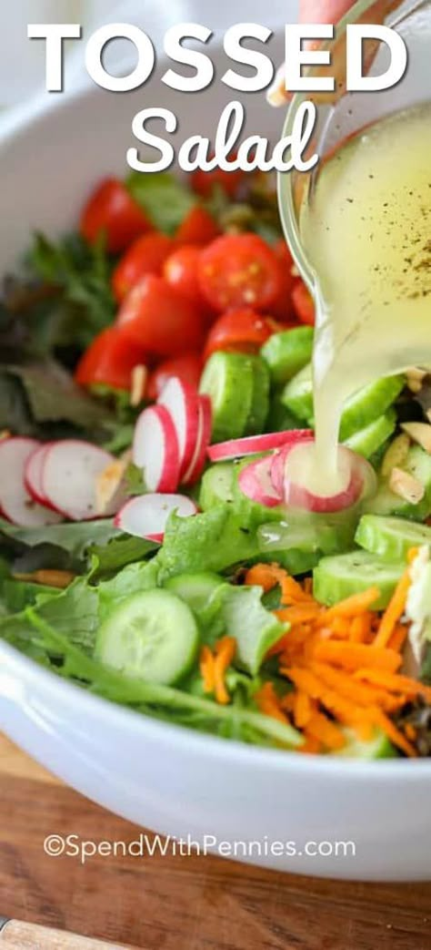 This simple tossed salad recipe is the perfect way to enjoy your garden vegetables! It is full of fresh lettuce, tomatoes, cucumbers and any other mixed vegetables you wish all drizzled with a delicious dressing! Mmmmm.... #spendwithpennies #tossedsalad #gardenvegetables #farmersmarketvegetables #sidesalad #healthyeating Simple Tossed Salad, Garden Salad Recipe, Almond Salad, Salad Macaroni, Lettuce Salad Recipes, Vegetable Salad Recipes, Green Salad Recipes, Fresh Salad Recipes, Spend With Pennies