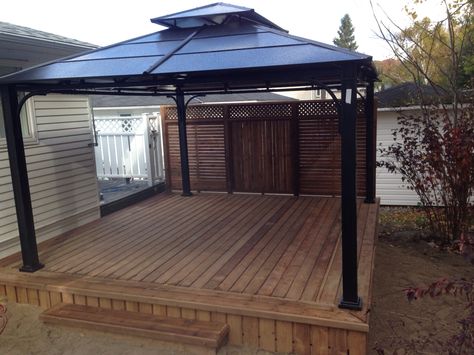 Beautiful deck with privacy fence and aluminum gazebo Gazebo Deck Ideas Backyard, Decks With Gazebo Ideas, Gazebo Deck Ideas, Floating Deck With Gazebo, Gazebo Privacy Ideas, Deck With Privacy Fence, Deck Gazebo Ideas, Gazebo Decorating Ideas Backyard, Deck With Privacy