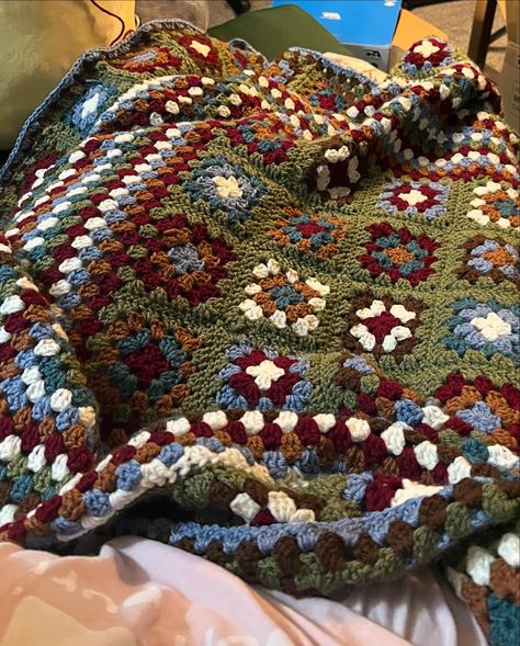 made this beautiful moody take on a granny square blanket early this year using my acrylic scrap yarn 💙 Aesthetic Crochet Squares, Crochet Scraps Blanket, Crochet Square Shawl, Grandma Blanket Crochet, Vintage Crochet Decor, Mismatched Granny Square Blanket, Repurpose Crochet Blankets, Earthy Granny Square, Earth Tone Granny Square