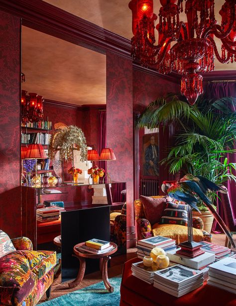 A damask wallpaper by Adelphi Paper Hangings wraps the library walls. French 1930s lamps and c. 1925 Indonesian... 1960s Chairs, Balloon Shades, Ikea Table, Maximalist Interior, Library Wall, All Things Red, Custom Mirrors, Chiavari Chairs, London Apartment