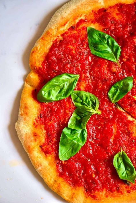 A delicious homemade Neapolitan Pizza marinara style - with a homemade authentic Italian pizza dough recipe, tomato sauce, garlic and olive oil. Pizza Marinara, Italian Pizza Dough Recipe, Pizza Spatula, Recipe Tomato, Authentic Italian Pizza, Garlic And Olive Oil, Big Pizza, Neapolitan Pizza, Pizza Dough Recipe