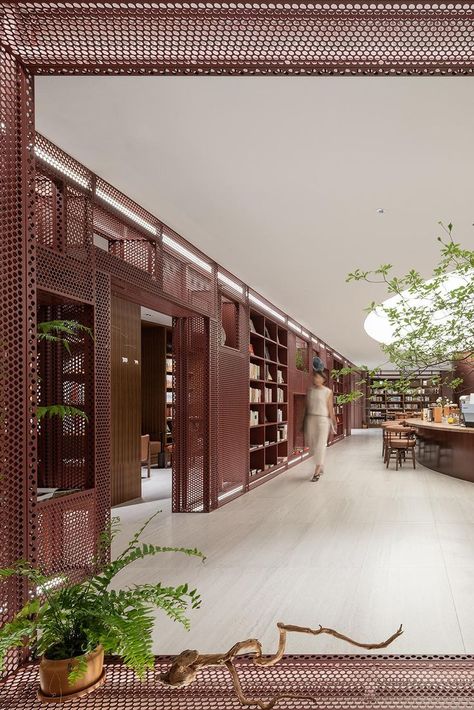 The name of the bookstore and the concept came from the creative happenstance of Mr. Lin Feng of CIFI Group. The bookstore's philosophy that takes books as mountains, poems as books, flowers as decorations, tea as fragrance, and wine as companion, forms the spirit of the entire bookstore. #architonic #design #architecture #architecturedesign #interiordesign #dailyarchitecture #architecturephotography #architecturelovers #projectdesign #interiorinspiration #store #bookstore #designlover #China Book Cafe Design Architecture, Creative Library Design, Book Concept Architecture, Library Of Things, Bookstore Design Interior, Book Store Design Interior, Library Concept Architecture, Book Cafe Interior Design, Book Shop Design