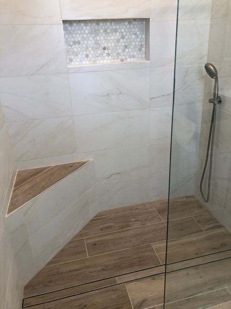 Tile Shower With Corner Bench, Walk In Shower Wood Floor, Gray Shower Tile With Wood Floor, Tiled Shower With Half Wall, Shower Tile Bench Ideas, Showers With Niches And Bench, Tile Patterns For Showers, Wood Tile Shower Niche, Shower With Wood Bench