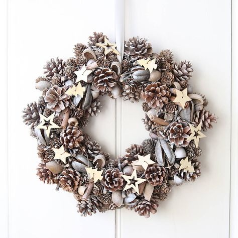 Christmas Door Decoration, Christmas Door Decor, Pre Lit Wreath, Cone Crafts, Pinecone Wreath, Cones Crafts, Contemporary Christmas, Pine Cone Crafts, Wooden Stars