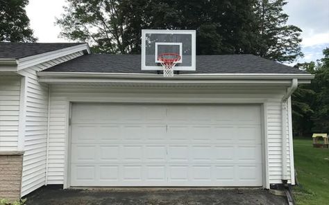 How To Install a Basketball Hoop on A Garage Wall or House? (7 Quick Steps) - Backyard Caring Garage Game Rooms, Graffiti Wallpaper, Basketball Game, Garage Walls, Basketball Hoop, A Basketball, Open House, Game Room, Homes For Sale