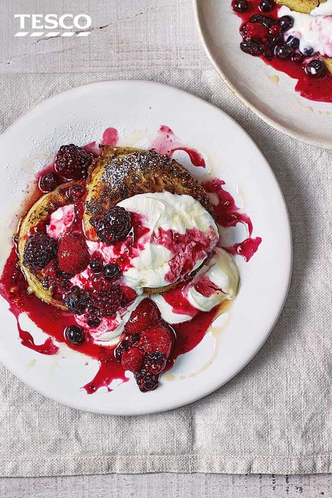 Do more than just spread them with butter – transform crumpets into this indulgent French toast brunch. Fluffy crumpets are fried until golden and topped with bright berry compote and a dollop of yoghurt for a new twist on a brunch classic. | Tesco Crumpets Toppings, British Breakfast Recipes, Breakfast Crumpets, Breakfast In Bed Ideas, Crumpet Recipe, Inspired Taste, Classic French Toast, Rhubarb Crumble, Tesco Real Food