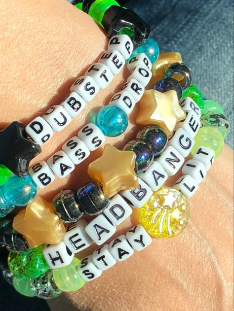 5 Dubstep themed Kandi beaded bracelets You will receive these exact bracelets *Dubstep *Headbanger *Stay Lit *Bass Drop *Pearly Gold Stars & Black Iridescent We make our Kandi bracelets using stretch string Available Sizes: OSFM 5 - 5.5 inches 5.5 - 6 inches 6 - 6.5 inches 6.5 - 7 inches 7 - 7.5 inches 7.5 - 8 inches 8 - 8.5 inches 8.5 - 9 inches Please send us a message to let us know what size bracelets you need. If you need a size not listed please contact us and we’ll be happy Edm Festival Bracelet, Rave Candies Idea, Alt Friendship Bracelet, Candy Bracelet Ideas Rave, Kandy Ideas Rave, Candy Bracelets Rave, Candy Rave Bracelets, Rezz Kandi, Club Rave Outfit