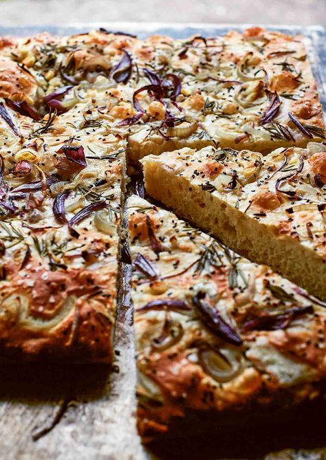 This focaccia with red onion and rosemary has that iconic crunchy, perfectly salted surface and a tender texture beneath. It’s topped with caramelized onions and fragrant rosemary and makes a worthy distraction—both the making and the devouring. Flora Shedden, Onion Focaccia, Pasta Puttanesca Recipe, Focaccia Recipes, Foccacia Recipe, Italian Chicken Soup, Italian Bread Sticks, Foccacia Bread, Carb Loading