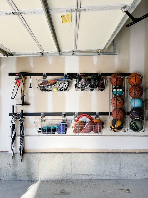 Easy Garage Storage Using the Rubbermaid FastTrack System - Life Love Larson Build Your Own Shelves, Easy Garage Storage, Garage Storage Inspiration, Garage Organizing, Organization Garage, Workshop Diy, Yard Diy, Garage Renovation, Suburban Home