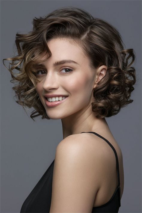 Elevate your look with this stunning curly bob hairstyle, perfect for adding volume and flair to your curls. The chic layers enhance the natural bounce, creating a playful yet polished vibe that works for any occasion. Whether you're headed to a brunch or a night out, this hairstyle showcases your curls beautifully while keeping it manageable. Embrace your curls with confidence and try this trendy curly bob! Large Curls, Cute Haircuts, Medium Short Hair, Curly Bob Hairstyles, Curly Hairstyles, Bob Hairstyle, Elevate Your Look, The Chic, Curly Bob