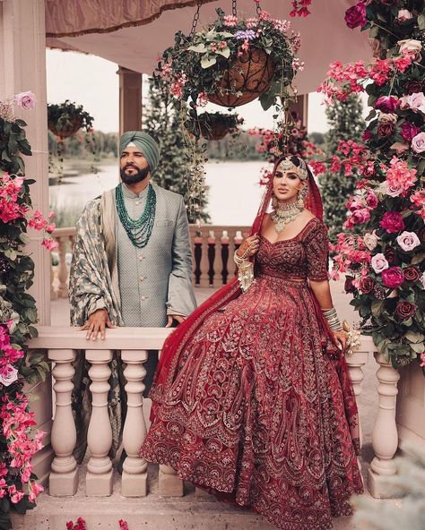 Embracing forever in a tapestry of love and royalty✨❤️ Punjabi Wedding Couple Outfit, Punjabi Wedding Dress, Kurta Ideas, Punjabi Wedding Couple, Dark Green Wedding, Anand Karaj, Indian Wedding Bride, Indian Groom Wear, Wedding Kurta