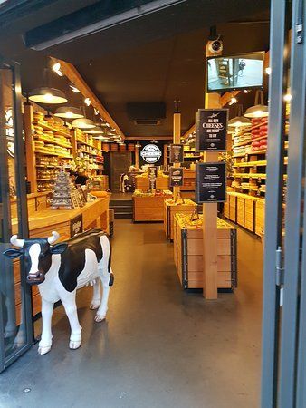 Dairy Farm Design, Old Amsterdam Cheese, Amsterdam Cheese, Cheese Branding, Dairy Shop, Meat Business, Amsterdam Pictures, Cheese Store, Deli Shop