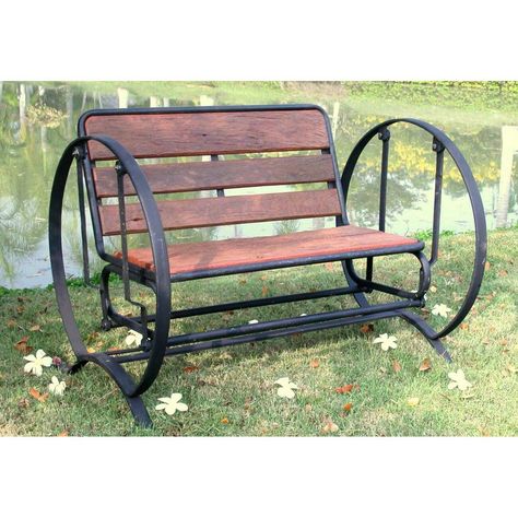 Unique Patio Furniture, Wagon Wheel Bench, Rustic Outdoor Benches, Garden Bench Ideas, Glider Bench, Outdoor Glider, Wagon Wheels, Rocking Chair Set, Teak Bench