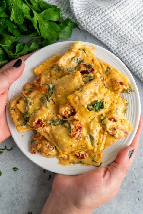 Creamy Tuscan Ravioli - The Cooking Duo Pesto Ravioli Recipe, Pesto Ravioli, Sun Dried Tomato Sauce, Cheese Ravioli, Ravioli Recipe, Easy Pasta Dishes, Spinach And Cheese, Dried Tomatoes, Sun Dried