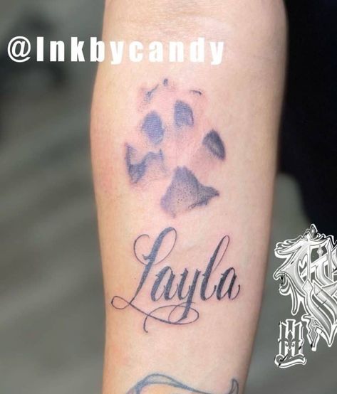 Dog Paw Tattoo With A Name of Layla Layla Tattoo, Dog Paw Tattoo Ideas, Paw Tattoo Ideas, Paw Print Tattoo Dog, Dog Paw Print Tattoo, Dog Memorial Tattoos, Pawprint Tattoo, Dog Paw Tattoo, Saved Tattoo