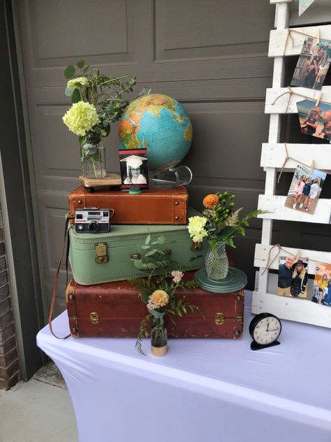 Travel Theme Wall Decor, Travel Theme Graduation Party, Up Themed Graduation Party, Around The World Party Ideas For Adults, Adventure Awaits Party, Agent Booth, Adventure Party Theme, Vintage Graduation Party, Wall Clock With Pictures