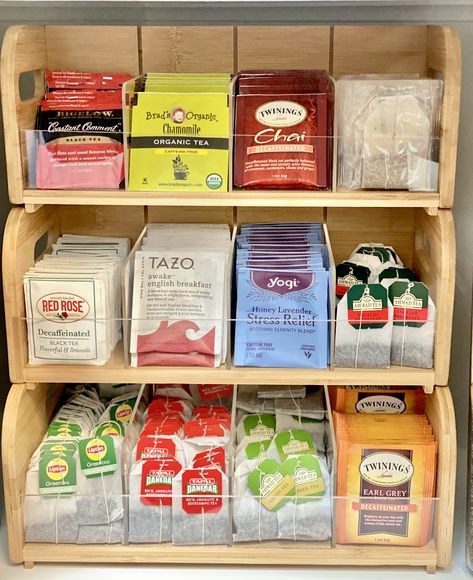 I had a difficult time finding the perfect organizer for my family's tea stash. Luckily, I found this gem on Amazon and it was perfect because it has three sections that were different sizes. Its perfect for if you buy one tea in larger quantities. It required minimal assembly and looks great on a countertop or in a cupboard. I have linked the Amazon page to this post for my tea lovers. As an Amazon Affiliate, I earn commission on eligible products. Tea Pantry Organization, Tea Selection Display, Tea Rack Ideas, Tea Desk, How To Store Tea Bags, Tea Spot In Kitchen, Tea Rack, Tea Organiser, Tea Station Small Spaces