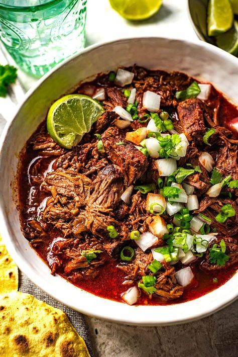 An ultra-flavorful take on the iconic Mexican beef stew - Birria de Res! Beef chuck roast is slowly simmered with garlic, onions, tomatoes, and a blend of guajillo and pasilla chiles until meltingly tender. Chile Rojo Beef, Beef Chuck Stew Meat Recipes, Chuck Roast Mexican Recipes, Mexican Chuck Roast Recipes, Chuck Roast Birria, Mexican Beef Recipes, Beef Chuck Roast Recipes, Birria Recipe Mexican, Birra Tacos