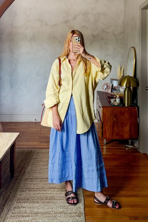 Big shirt, big skirt is my vibe for summer. I love this Dôen sebastian skirt in blue stripe, it is so soft and comfortable. I paired this midi skirt with a vintage men's oversized button down and stuck with blue and yellow for color blocking. This is an easy summer outfit that is chic and perfect for lunch dates or running to the farmers market. #coastalaesthetic #europeansummeraesthetic #sezanelovers • European summer outfits • french girl fashion • casual chic outfit ideas • butter yellow • Dress And A Shirt Outfit, Oversized Shirt And Midi Skirt Outfit, Yellow Stripes Outfit, Collared Button Up Shirt Outfit, Skirt Outfits 2024 Summer, Doen Sebastian Skirt, Full Coverage Summer Outfit, Blue Striped Outfit, Long Skirt Button Up Shirt