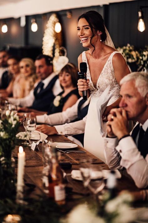 Bride in a v-neck lace wedding dress with pearl earrings reading out her wedding speech Must Haves For Wedding, Wedding Games Outdoor, Wedding Speech Ideas, Speech Wedding, Must Have Wedding Pictures, Wedding Entertainment Ideas, Bride Speech, Wedding Shot List, Wedding Speeches