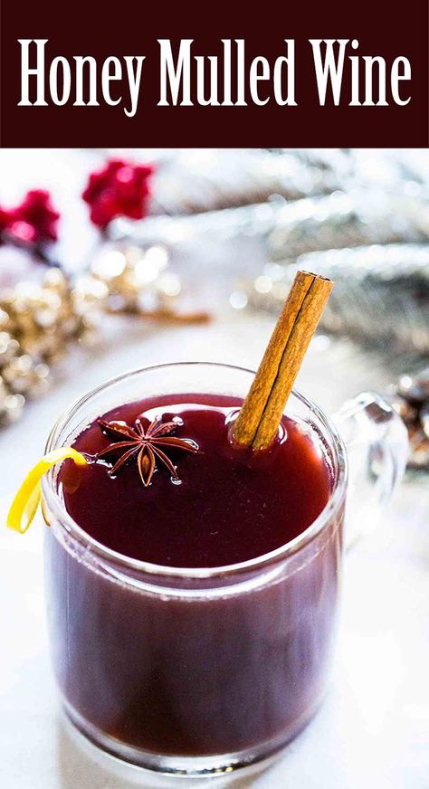 Get into the holiday spirit with Honey Mulled Wine! This red wine is sweetened with honey and spiced with cinnamon. It's an easy (and easy to love) winter warmer. #mulledwine #winter #holiday #christmas #party #simplyrecipes