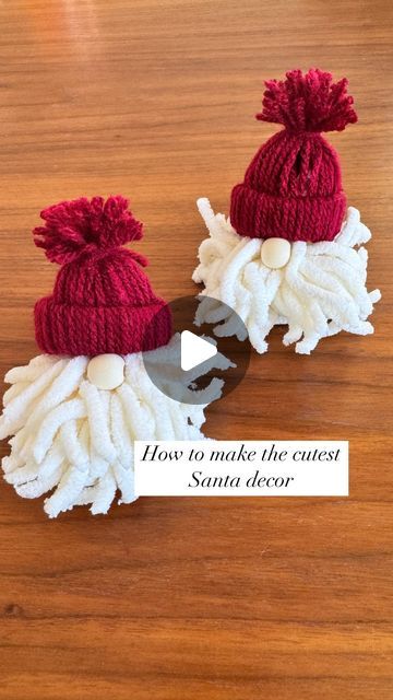 Maïlys | Home Decor | Affordable | DIY on Instagram: "How to Make Mini Santa / Elf 🧑‍🎄 !

Let’s create the cutest mini Santa / elf this holiday season! 🎅✨

Here’s how:
1️⃣ Hat Base: Cut a small circle out of a paper roll.
2️⃣ Hat Design: Use red wool. Fold each piece in half and loop it around the paper circle. Repeat until the entire ring is covered. Push the wool ends inside the circle to form the base of the hat. Add some paper towel inside for shape, tie a piece of wool at the top, and trim the ends to make a pompom. 🎀
3️⃣ Beard: Tape two chopsticks on the table, then roll white wool between them to create the beard. Secure it in the middle with a knot, trim the ends, and shape it into a fluffy ball.
4️⃣ Final Touches: Glue the hat to the beard. Add a beige pearl under the hat for Elf Hat Diy, Wool Santa, Make A Pompom, Paper Circle, Diy Wool, Santa Beard, Santa Crafts, Wooly Hats, Santa Head