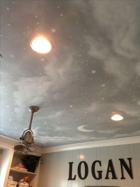 Love the night sky painted mural on the ceiling of the nursery Ceiling Stars Bedroom, Nursery Night Sky Ceiling, Painted Ceiling Mural Art, Nursery Ceiling Paint, Star Ceiling Nursery, Night Sky Room Ideas, Sky Wall Painting Bedrooms, Grey Wall And Ceiling, Night Sky Celling