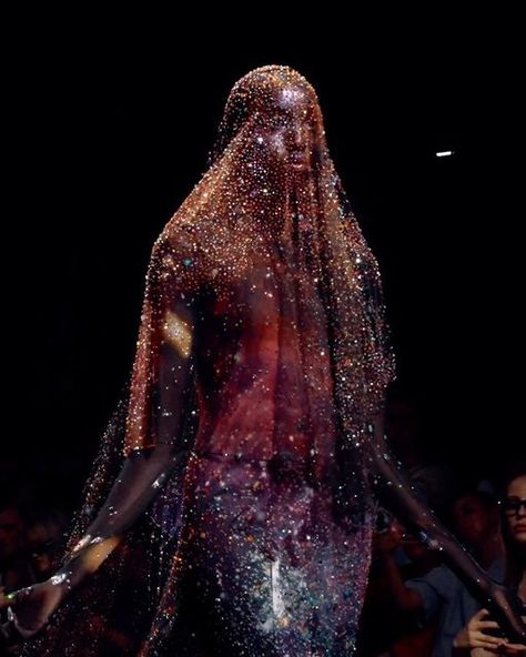 ROBERT WUN• on Instagram: "🪐The Soul Gown  The Closing Look of our FW24 Couture Collection. Consists of 97000 @swarovski crystals embroidery with a total of 1430 hours of hand work. A recreation of the Milky Way through couture craftsmanship, an interpretation of the search for soul within the stars.   Embodied by muse @nyauethriam   #robertwun •" The Soul Robert Wun, Soul Dress Robert Wun, Robert Wun Soul Dress, Robert Wun Soul, Robert Wun 2024, Swarovski Crystals Dress, Robert Wun Couture, Crystal Outfit, Crystal Clothing