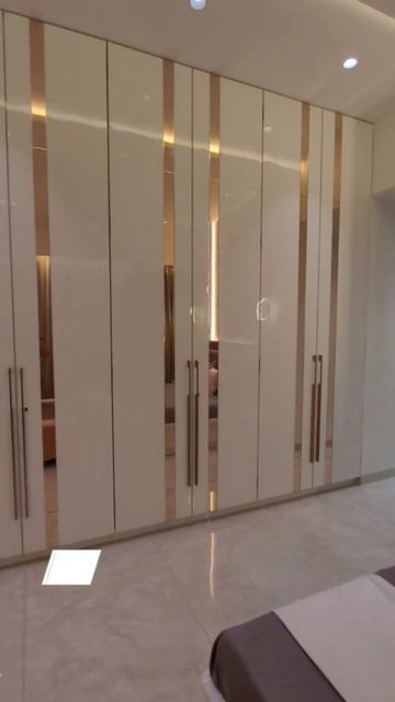 White And Golden Wardrobe Design, Glossy Cupboards Bedroom, Sun Mica Design Wardrobe, Wardrobe Design With Golden Strip, White Wordroab Design, Sliding Almirah Designs Bedrooms, Latest Almari Design Bedroom, Dresser Room Ideas, Acrylic Wardrobe Design Bedroom