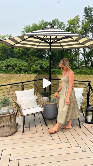 Sarah & Dan | DIY & Design on Instagram: "DIY UMBRELLA STAND TABLE✨ I love a good diy that’s beautiful & functional! We wanted to add seating to this little corner of the deck with an umbrella for shade. We are loving this chair set & umbrella from @walmart they really helped complete this space for a little summer oasis!    #walmartpartner #walmarthome #welcometoyourwalmart #likeit #diyumbrellastand #diypatio #umbrellastand   The chairs are on sale!! // Shop the links for the chairs, planters, umbrella and accessories over on my @shop.ltk - https://liketk.it/4bADv //" Outdoor Parasol Patio Umbrellas, Umbrella Stand Side Table Diy, Outdoor Patio Umbrella Ideas, Diy Umbrella Side Table, Outdoor Umbrella Stand Diy, Patio With Umbrella Ideas, Parasol Base Ideas Diy, Garden Umbrella Ideas, Outdoor Umbrella Ideas