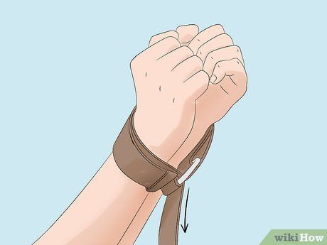 How To Make Handcuffs Out Of A Belt, Belt Handcuffs Tutorial, Things To Send To Her, Handcuffs Drawing, Diy Body Harness, Belt Handcuffs, How To Tie A Belt, Belt Knots, Romantic Games