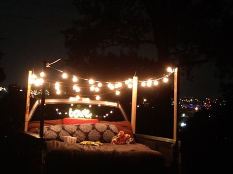 Had a romantic birthday date night with a view of the city. Hubby made the stakes that went into the bed of the truck. Truck Bed Date Projector, Pickup Bed Date Night, Truck Bed Camping Romantic Date Ideas, Truck Bed Date Ideas, Backyard Date Night Ideas Romantic, Back Of Truck Date Night, Pickup Truck Date, Truck Bed Camping Diy, Truck Bed Date Night