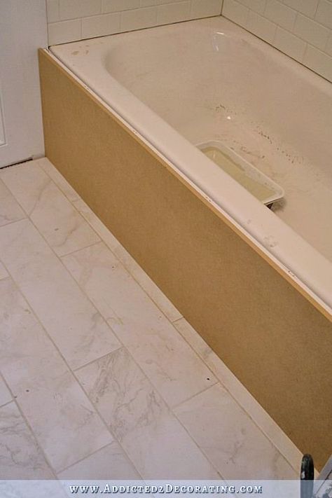 build a DIY tub skirt - step 3 - cover the frame with a solid piece of MDF or plywood Tub Skirt Ideas, Diy Tub Skirt, Bathtub Skirt, Tub Skirt, Diy Tub, Bathtub Makeover, Bathroom Rehab, Bathtub Wall, Tub Remodel