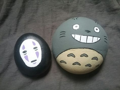 I painted some Studio Ghibli themed rocks. Rock Painting Ideas Studio Ghibli, Stone Art Aesthetic, Studio Ghibli Painted Rocks, Rock Paintings Aesthetic, Studio Ghibli Rock Painting, Anime Rock Painting Ideas, Anime Rock Painting, Aesthetic Stone Painting, Painted Rocks Aesthetic