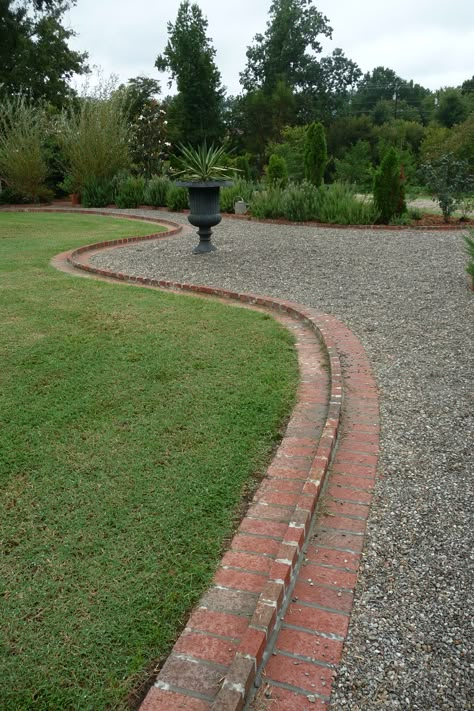 This was my favorite gravel with the Brick border. Kyle also mentioned it would be good since it was also small. Driveway Brick Edging, Gravel Driveway With Brick Edging, Brick And Gravel Walkway, Brick And Gravel Driveway, Gravel Driveway Edging, Driveway Edging, Brick Garden Edging, Brick Border, Brick Driveway