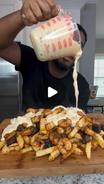 Seafood Network🦞🦐🦀🦑🐙🍤 on Instagram: "Loaded Surf & Turf Fries! 🍤🥩 🎥 eatwitzo  Ingredients: 1-2 lb steak cubed (ny strip or sirloin)  1 lb large shrimp  1-2 tsp chili powder 1-2 tsp dried oregano  1-2 tsp onion powder  1-2 tsp black pepper 1-2 tsp salt (optional)  *Use separate seasoning amount for steak & shrimp*  For fries:  6-8 large russet potatoes peeled  Large ice water bath  Directions-  1. Cut fries and add to water bath to soak for At least 30 minutes (to remove all starch)  2. Pat fries dry and bring oil to 300 F and fry for 5-6 minutes until fully cooked.  3. Set aside and bring oil to 375 F. Fry for another 1-2 minutes until golden brown and crispy!  For Queso:  8 oz Oaxaca cheese  8 oz blanco velveeta or queso cheese  1/2 cup diced pickled jalapenos  1-2 tsp chili powd Shrimp And Fries Recipe, Surf And Turf Nachos With Queso, Loaded Steak Fries, Seafood Loaded Fries, Texas Fries, Surf And Turf Nachos, Steak Loaded Fries, Loaded Fries With Steak, Cajun Loaded Fries