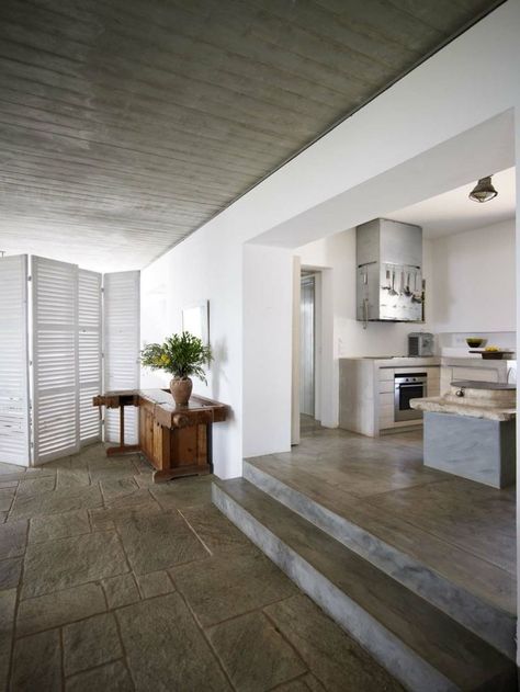 How an Greek architect designed his holiday house in Hydra. Split Level Kitchen, Sunken Living Room, Concrete Kitchen, Casas Coloniales, Open Concept Kitchen, House Extensions, Architect Design, Kitchen Flooring, 인테리어 디자인