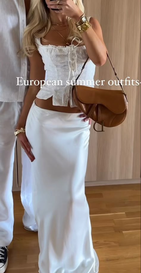 Beach Trendy Outfits, Mykonos Going Out Outfit, Holiday Aesthetic Summer Outfits, Holiday Outfits Summer Spain, Day Holiday Outfits, Long Silk Skirt Outfits For Summer, Silk White Skirt, Summer Outfits Evening, Montauk Outfits